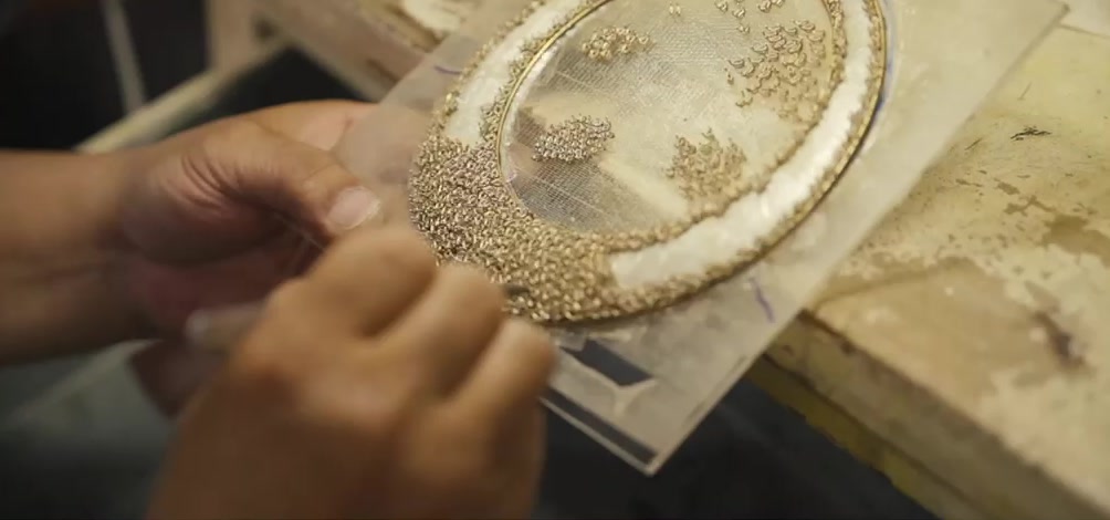 Beadwork on a jewelry template